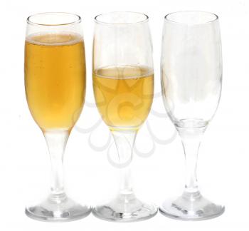 three glasses of champagne on a white background