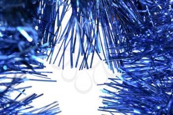 blue tinsel on a white background