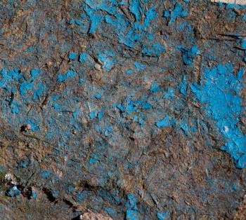 abstract background in grunge style. with blue paint on a wooden texture