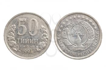 Uzbek coin on white background