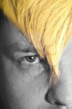 men's eyes and yellow hair. macro