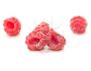 fresh ripe raspberries on a white background. macro