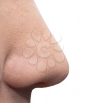 Women's nose on a white background close-up