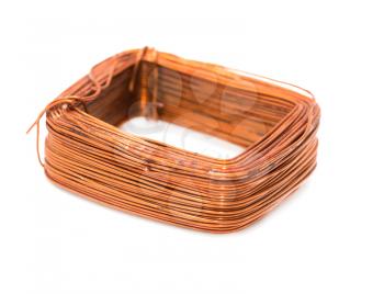 a coil of copper wire on a white background