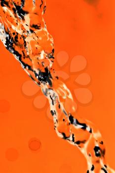 water on an orange background