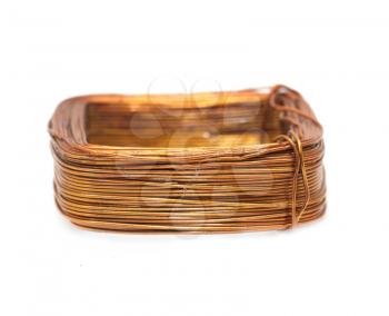a coil of copper wire on a white background