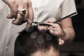haircut at the barber scissors