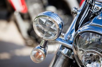 Headlight on a sport motobike as a detail