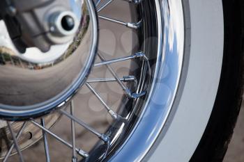 Wheel on a sport motobike as a background