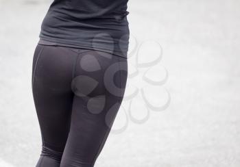 Beautiful ass girl in black pantyhose in the park