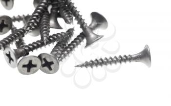 Screws for construction on a white background .