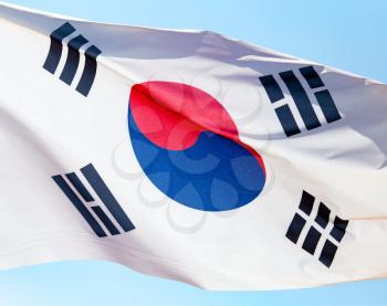 Flag of South Korea against the blue sky .