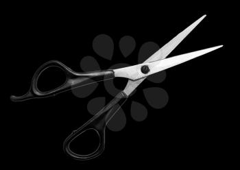 scissors on a black background