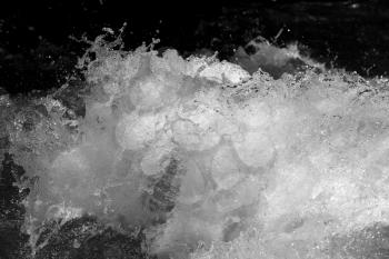 abstract background. rough water with splashes