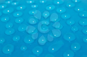 water drops on a blue background. macro