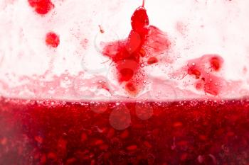 background of raspberry jam in a jar. macro