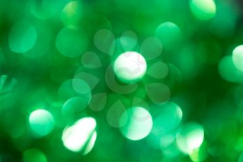 holiday background of green bokeh