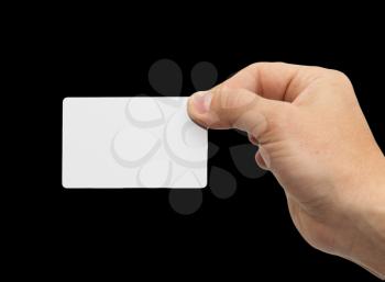 white card in hand on a black background