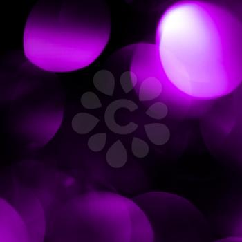 beautiful holiday background of purple bokeh
