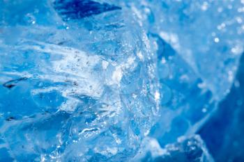 background of blue ice. Macro