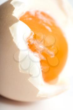 egg with yolk on white background