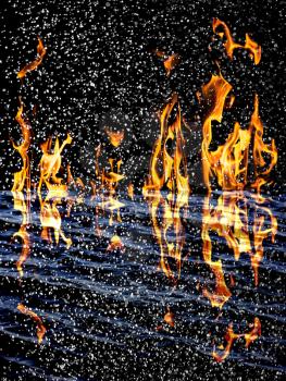 snow on the fire background with reflection on water