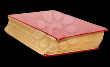 old red book on a black background