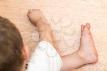 baby's feet on the floor