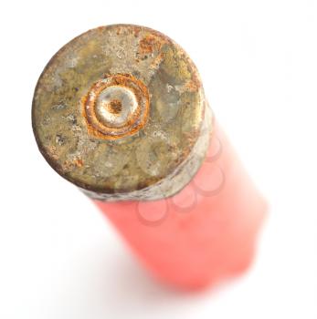 cartridge from a gun on a white background