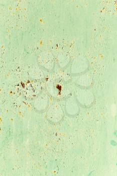 abstract background of rusty metal painted green