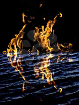 flame fire with reflection in water