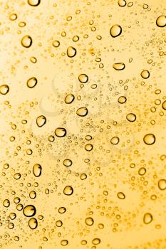 water drops on glass with gold