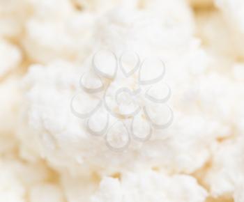 white curd as background. macro