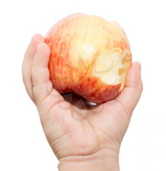apple in the children's hand on a white background
