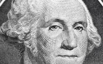 US one (1 ) dollar bill in a macro shot, super macro, close up photo. Shallow depth of field effect. George Washington portrait.