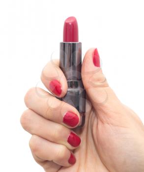 red lipstick in hand with red nail polish on a white background
