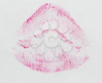 red lipstick on white paper