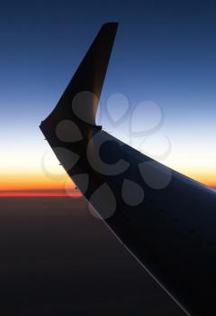 wing aircraft at sunset