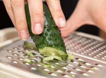 sliced cucumber on a grater