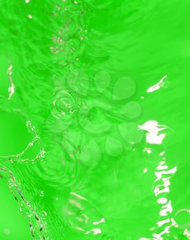 splashes of water on a green background