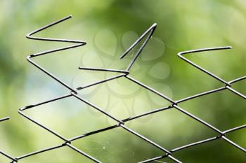 Rusty metal grille fence macro and nature background