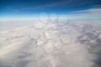 blue sky high view from airplane clouds shapes
