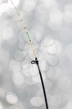 rod on background of water