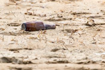 glass bottle in the sand