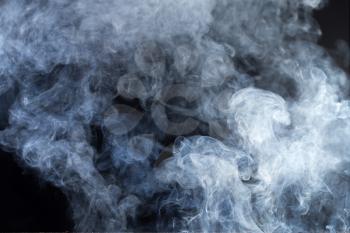 Smoke fragments on a black background