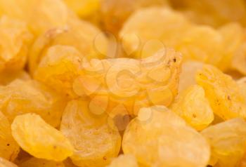 Golden raisins close-up background