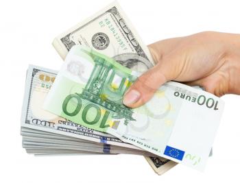 Euros and Dollars in hand on a white background
