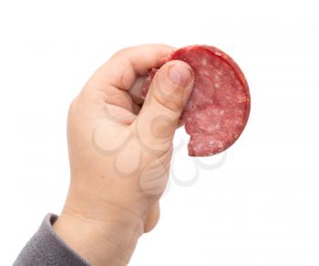 sausage in his hand on a white background