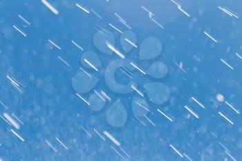 rain drops on a background of blue sky
