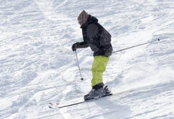 Athlete skiing in the snowy mountains